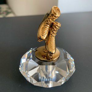 A Pair of Ice Skates on Crystal Stand